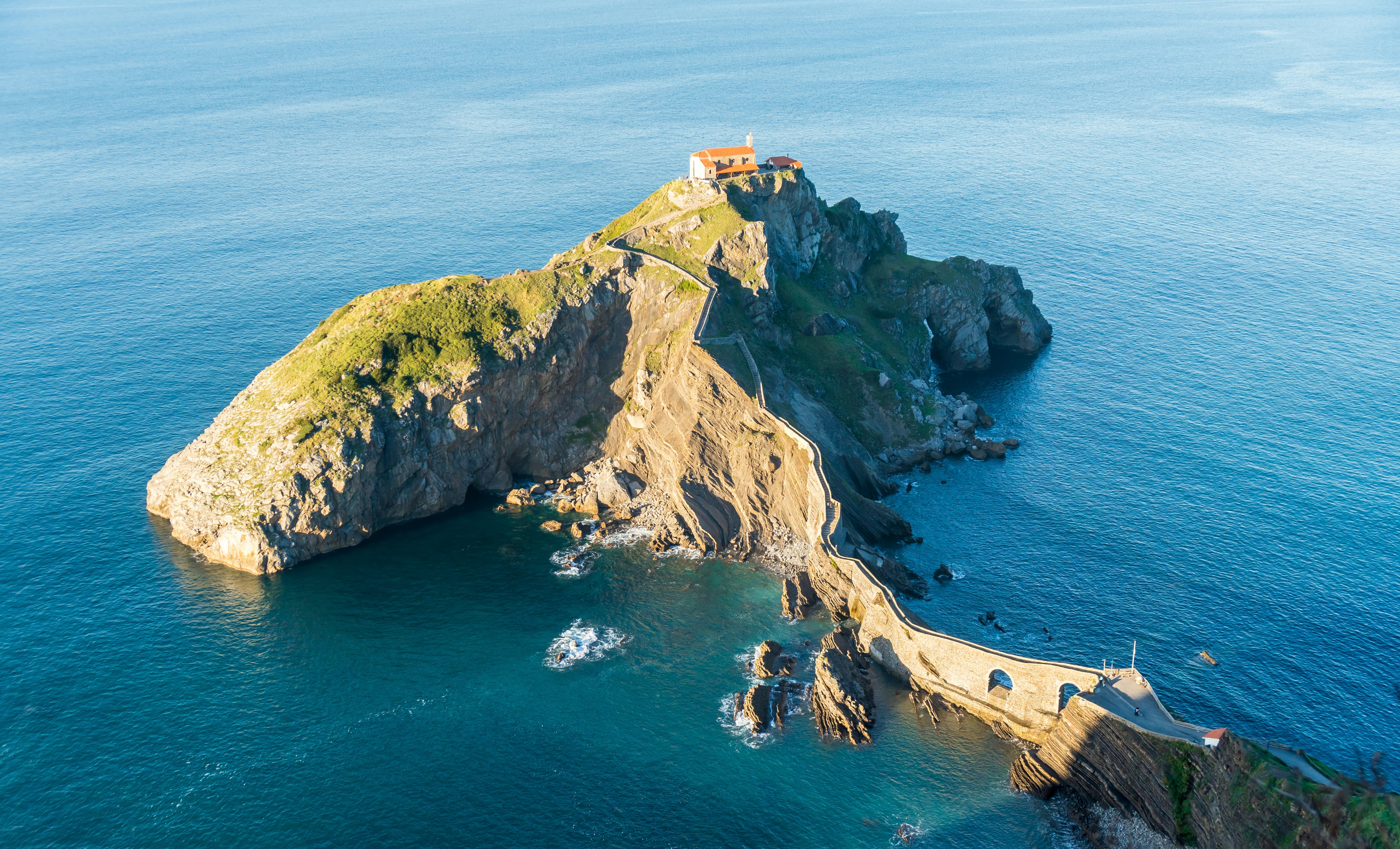 aerial photography of house on top of island